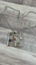 Load and play video in Gallery viewer, Pair of Heart Gear Necklaces
